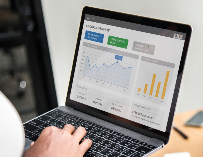 Notebook with open dashboard with growing organic traffic